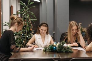 People sitting and celebrating Christmas Party